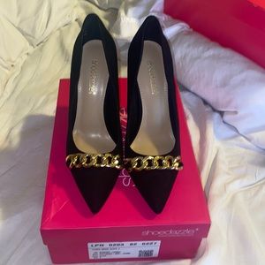 Black heels with gold chain